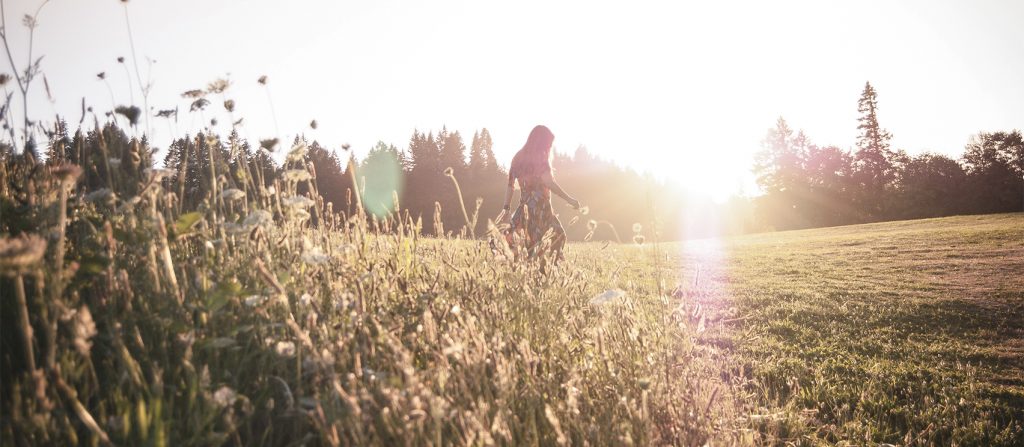 Person walking in field